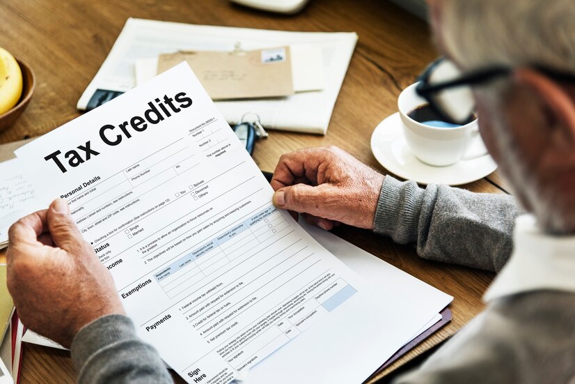 tax-credits-claim-return-deduction-refund-concept_53876-127998